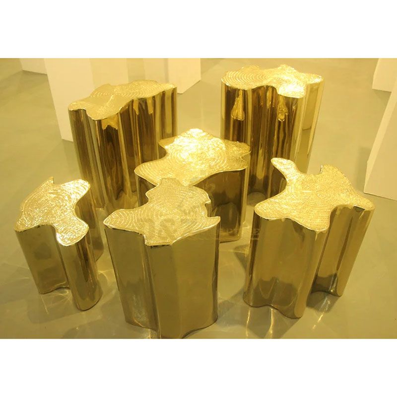 Golden stainless steel chair metal sculpture